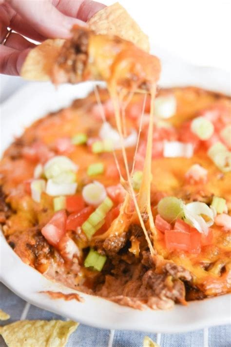 hot-layered-taco-dip-with-ground-beef image