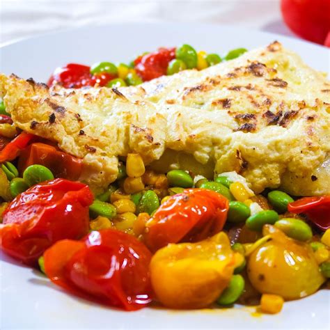 parmesan-dijon-crusted-cod-on-burst-tomatoes image