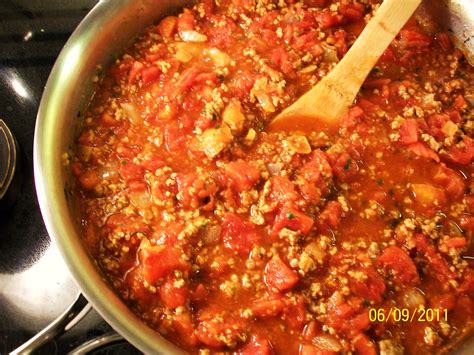 italian-pasta-sauce-with-meat-and-fresh-herbs image