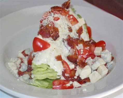 iceberg-wedge-blue-cheese-bacon-tomato-salad image