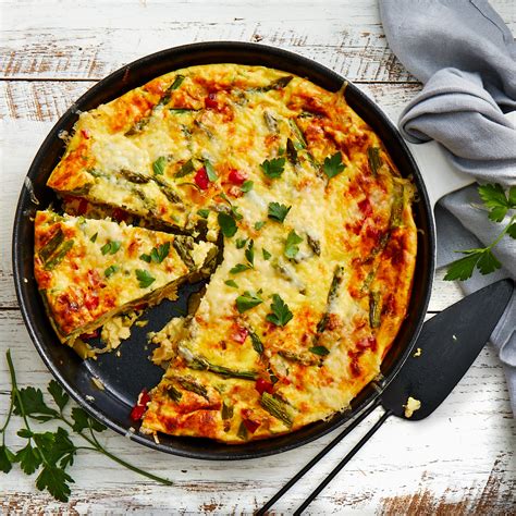 baked-asparagus-cheese-frittata-recipe-eatingwell image