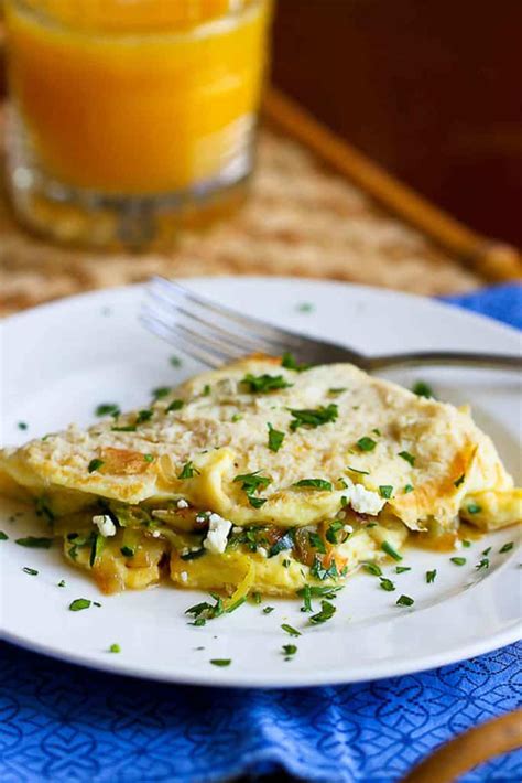 veggie-omelette-with-zucchini-caramelized-onions image