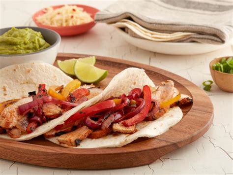 tex-mex-pork-fajitas-with-peppers-and-onions-food image