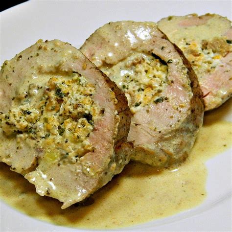pesto-and-cheese-stuffed-pork-tenderloin-allrecipes image