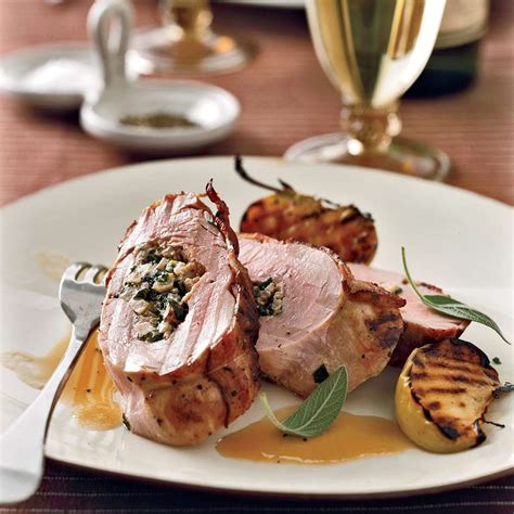 stuffed-pork-tenderloins-with-bacon-and-apple-riesling image