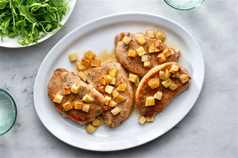 baked-apple-pork-chops-recipe-the-spruce-eats image