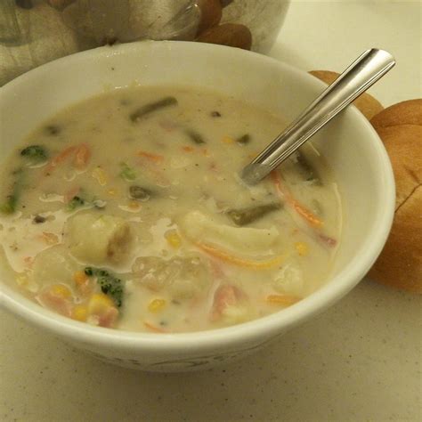 hearty-veggie-soup-in-a-creamy-mushroom-broth image