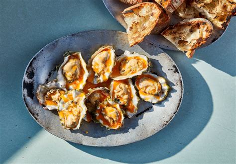 grilled-oysters-with-hot-sauce-butter-recipe-nyt image