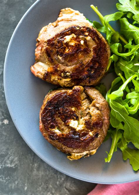 spinach-cheese-stuffed-flank-steak-rolls image