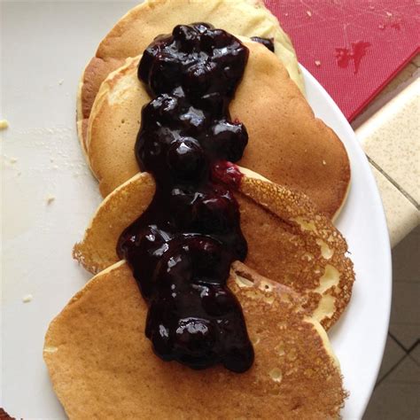 lemon-ricotta-pancakes-with-blueberry-sauce-allrecipes image