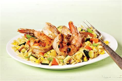 grilled-cajun-shrimp-with-summer-vegetable-orzo image