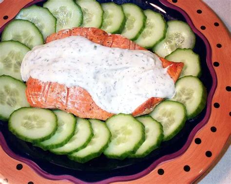 grilled-salmon-with-chive-and-dill-sauce-and-cucumbers image