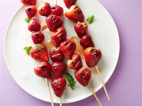 grilled-strawberry-kebabs-with-lemon-mint-sauce-food image