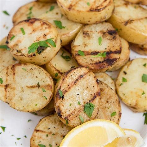 grilled-potatoes-with-garlic-lemon-and-herbs image