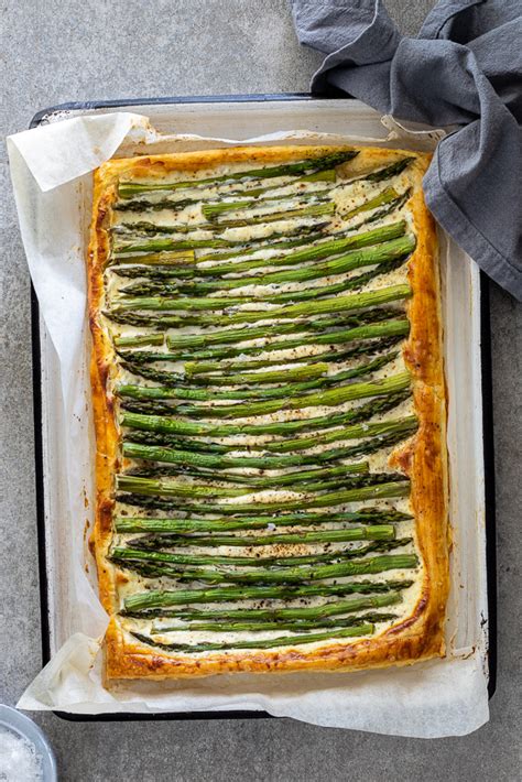 cheesy-puff-pastry-asparagus-tart-simply-delicious image