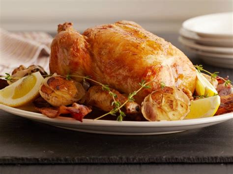 lemon-and-garlic-roast-chicken-recipe-ina-garten image