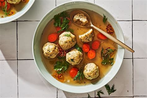 how-to-make-vegetarian-matzo-ball-soup-delish image