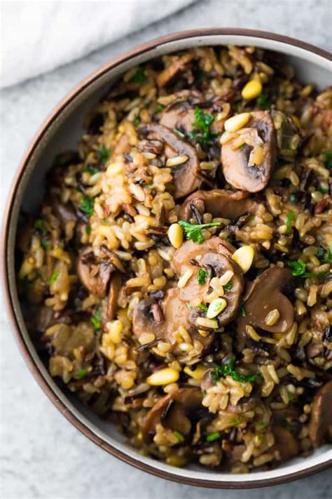 instant-pot-wild-rice-pilaf-with-mushrooms-and-pine-nuts image