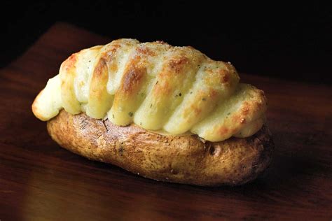 twice-baked-potatoes-with-irish-cheddar-leites-culinaria image