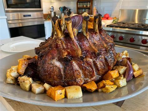 crown-roast-of-pork-with-roasted-root-vegetables image