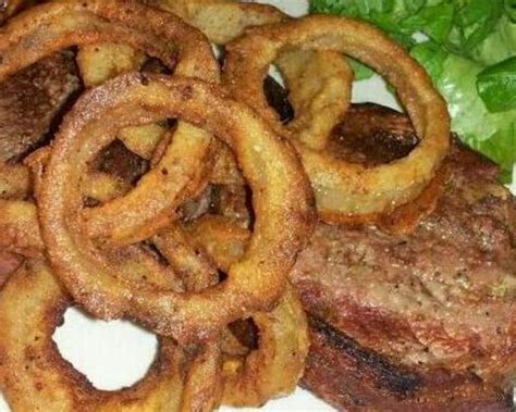 grilled-rib-eyes-and-fried-onion-rings-recipe-foodcom image