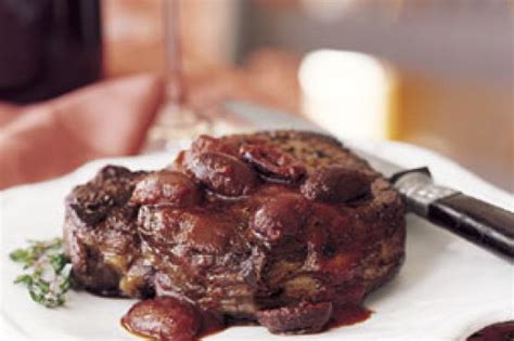 herb-rubbed-steaks-with-olives-provencal image