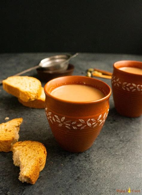 indian-masala-chai-spiced-milk-tea-piping-pot-curry image