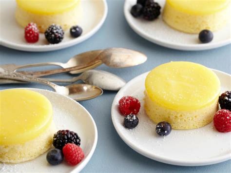 lemon-pudding-cake-with-fresh-mixed-berries-food image
