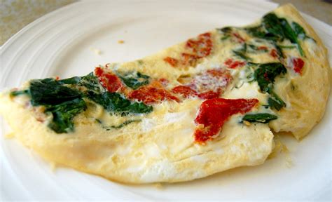 spinach-and-oven-roasted-tomato-omelet-food image