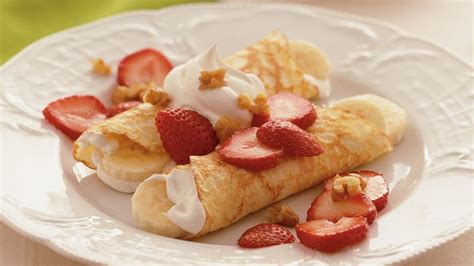 strawberry-banana-crepes-recipe-bettycrockercom image