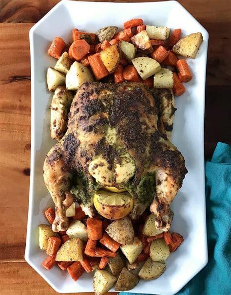 pesto-roast-chicken-with-potatoes-and-carrots image