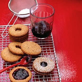 hazelnut-linzer-cookies-with-blackberry-jam-bon-apptit image