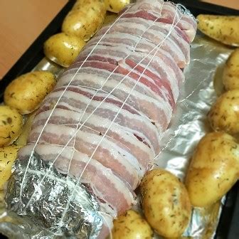 bacon-wrapped-stuffed-pork-tenderloin-amiable-foods image