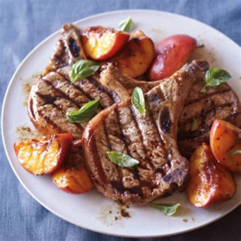 grilled-pork-chops-with-caramelized-peaches-and-basil image