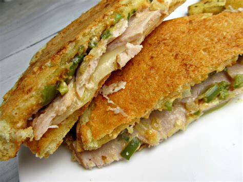 parmesan-crusted-sourdough-turkey-sandwich-clean-fingers image