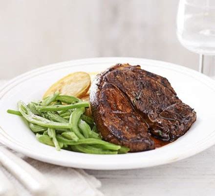 lamb-steaks-with-crispy-potatoes-minted-beans image
