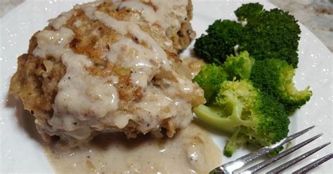 baked-pork-chops-and-stuffing-with-cream-of-mushroom image