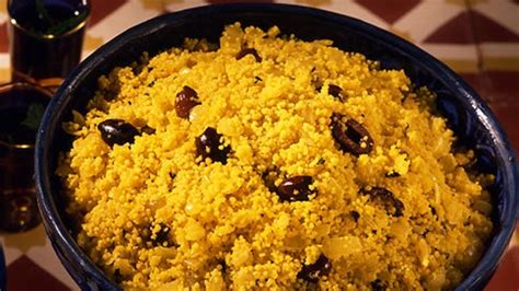golden-couscous-with-olives-lemon-and-fresh-herbs image