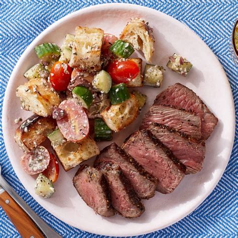 italian-style-steaks-panzanella-with-olives-parmesan image