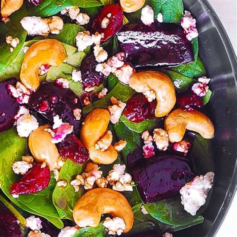 beet-salad-with-spinach-cashews-and-goat-cheese image