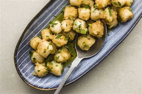 bay-scallops-with-garlic-recipe-the-spruce-eats image