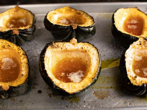 maple-roasted-acorn-squash-recipe-food-network image