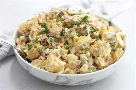 creamy-cajun-potato-salad-bite-on-the-side image