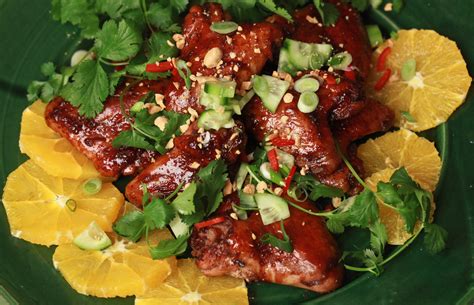spicy-lacquered-chicken-wings-recipe-nyt-cooking image