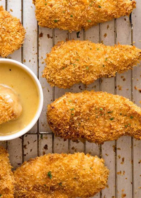 truly-crispy-oven-baked-chicken-tenders-recipetin-eats image