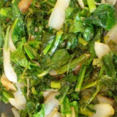 sweet-and-tangy-sauteed-collard-greens-allrecipes image