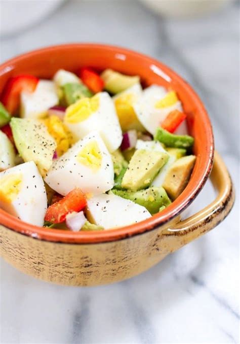 egg-and-avocado-salad-eating-bird-food image