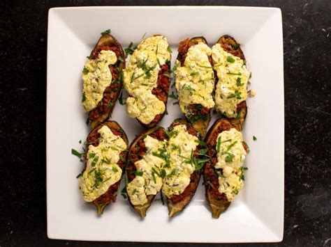 spiced-lamb-stuffed-eggplants-recipe-ina-garten-food image