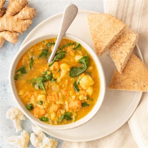 indian-spiced-lentil-soup-with-sweet-potato-spinach image