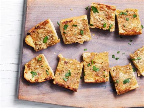 cheesy-roasted-garlic-bread-recipe-food-network image